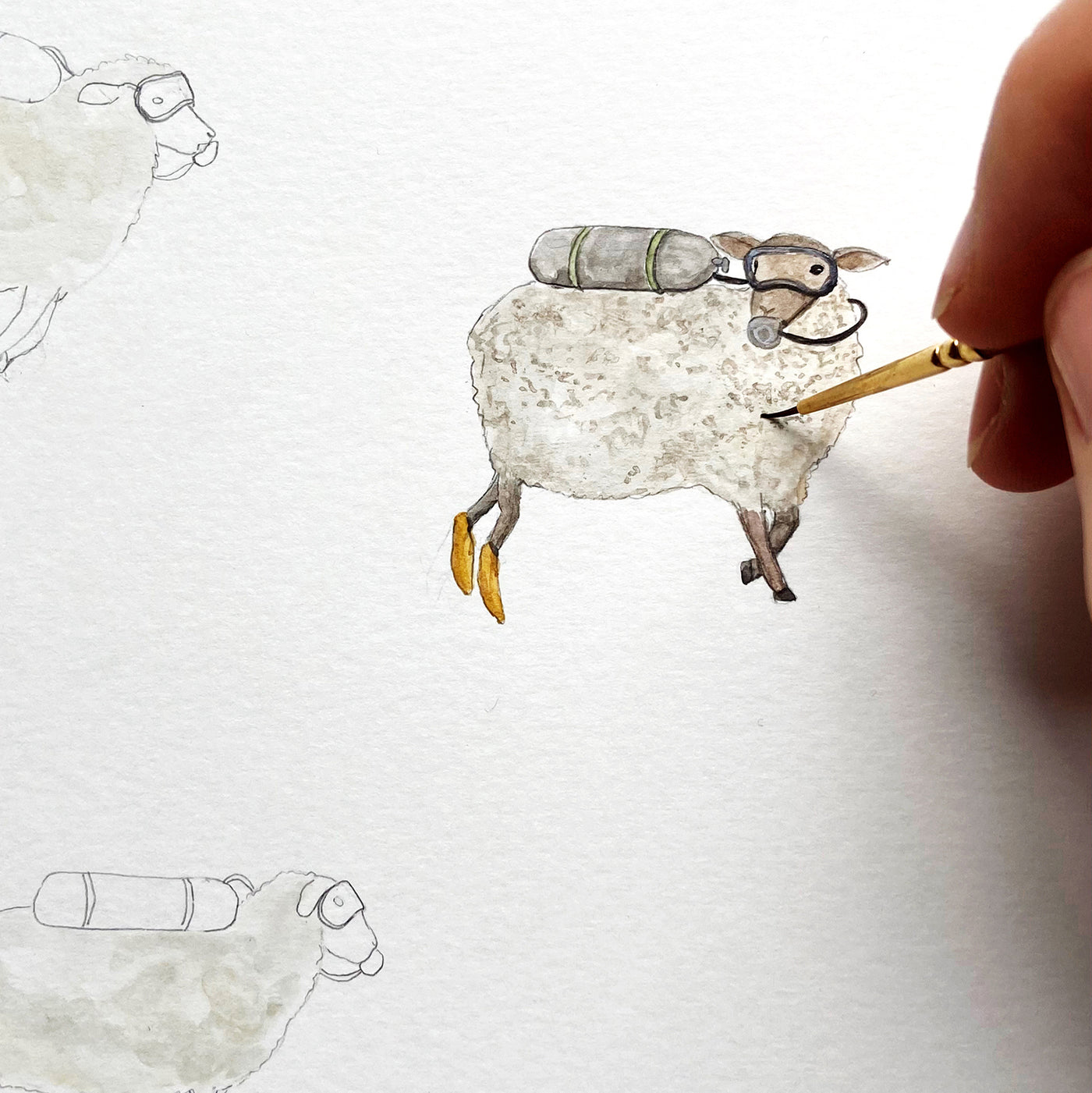 A hand painting a watercolour sheep in a diving mask