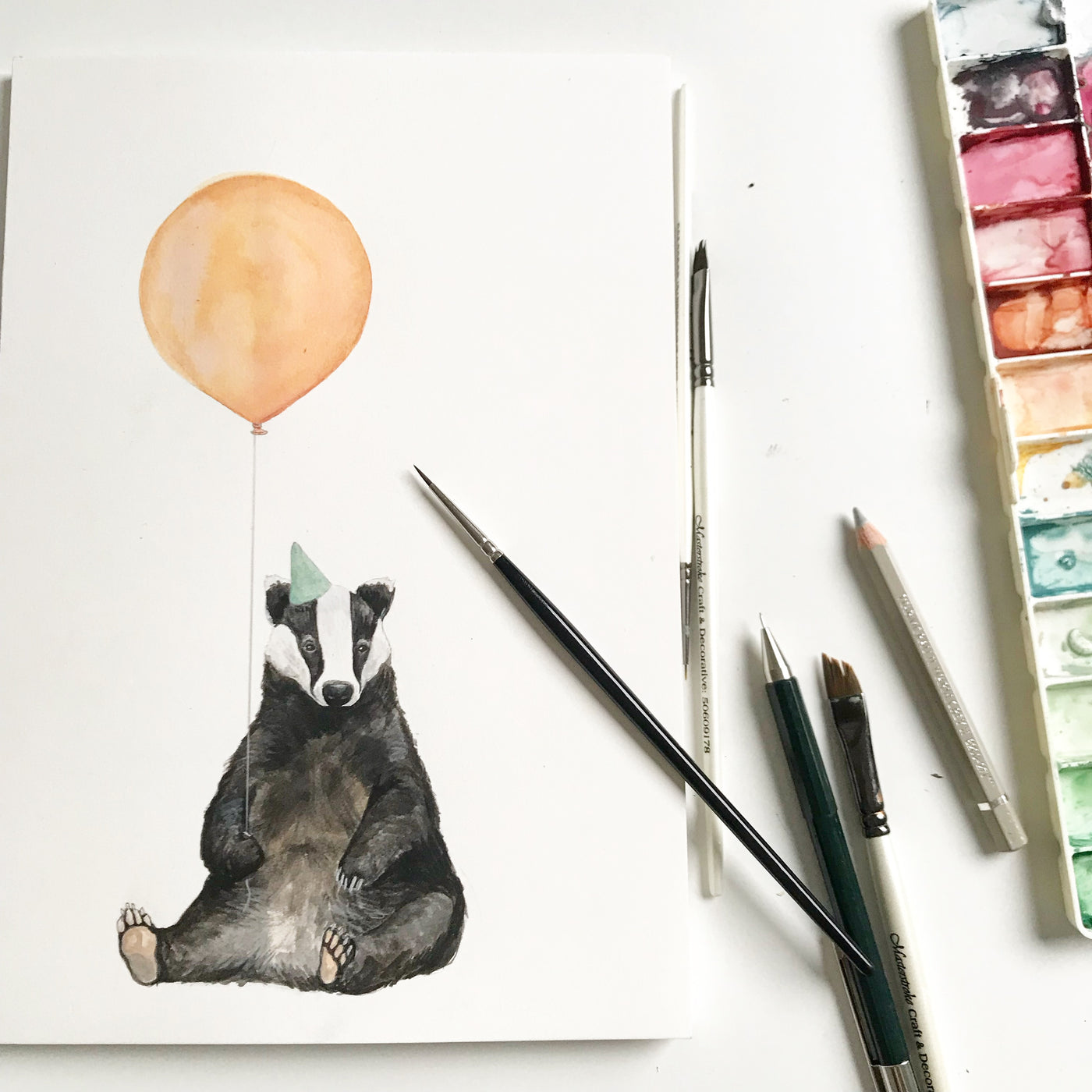 Hand painted badger with balloon illustration